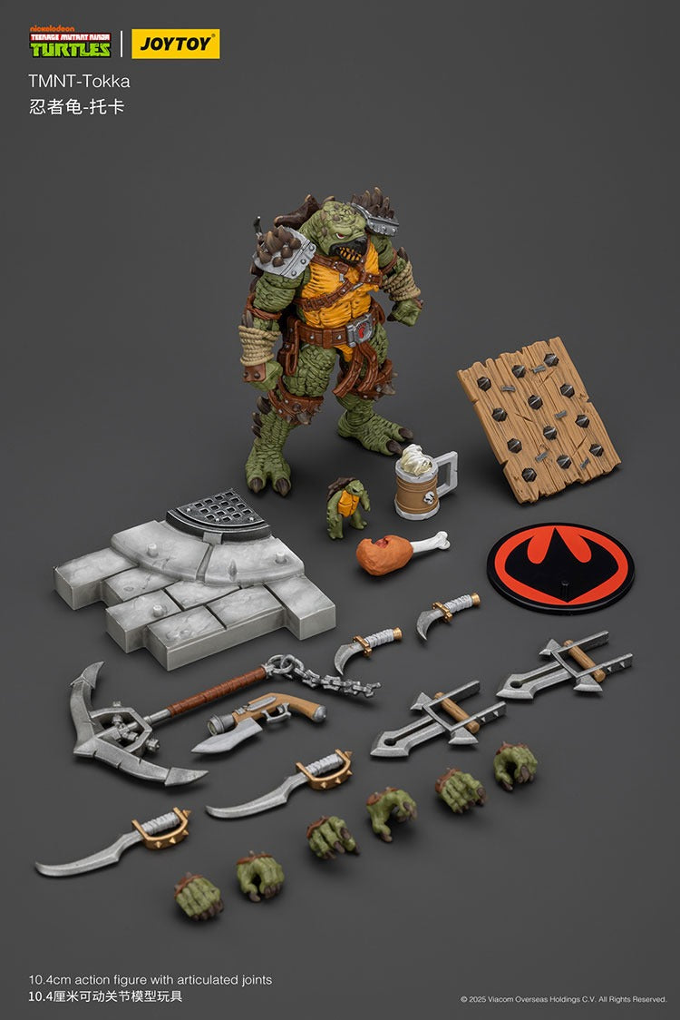 oyToy TMNT Tokka 1/18 scale action figure with weapons, accessories, and display stand Box content