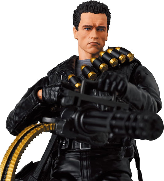 MAFEX T-800 Terminator 2 action figure with minigun, shotgun, and alternate heads – posed with sunglasses and ammo bag